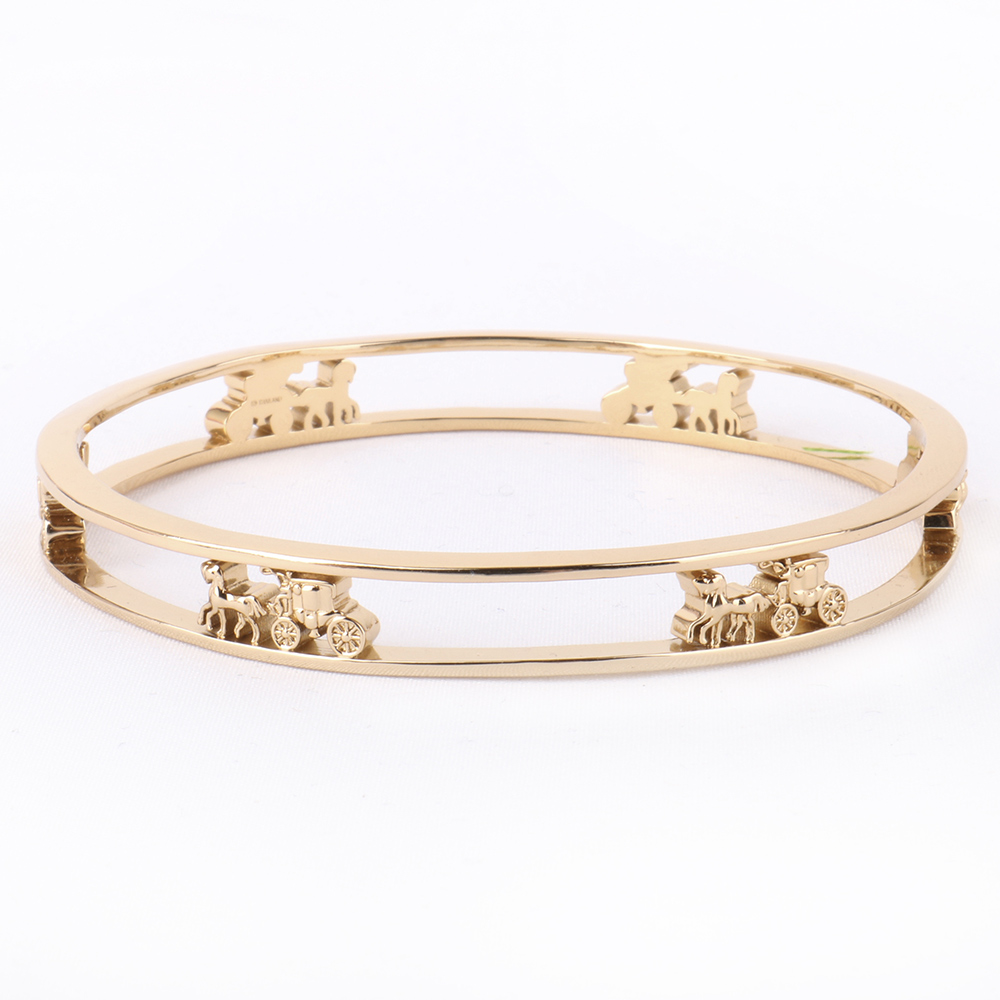 COACH 鏤空馬車雕飾不可調手環(亮金色)好評推薦 COACH 鏤空馬車雕飾不可調手環(亮金色)好評推薦